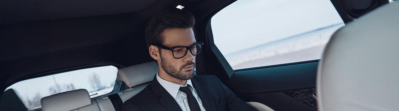 Corporate transportation — business passenger in chauffeured car