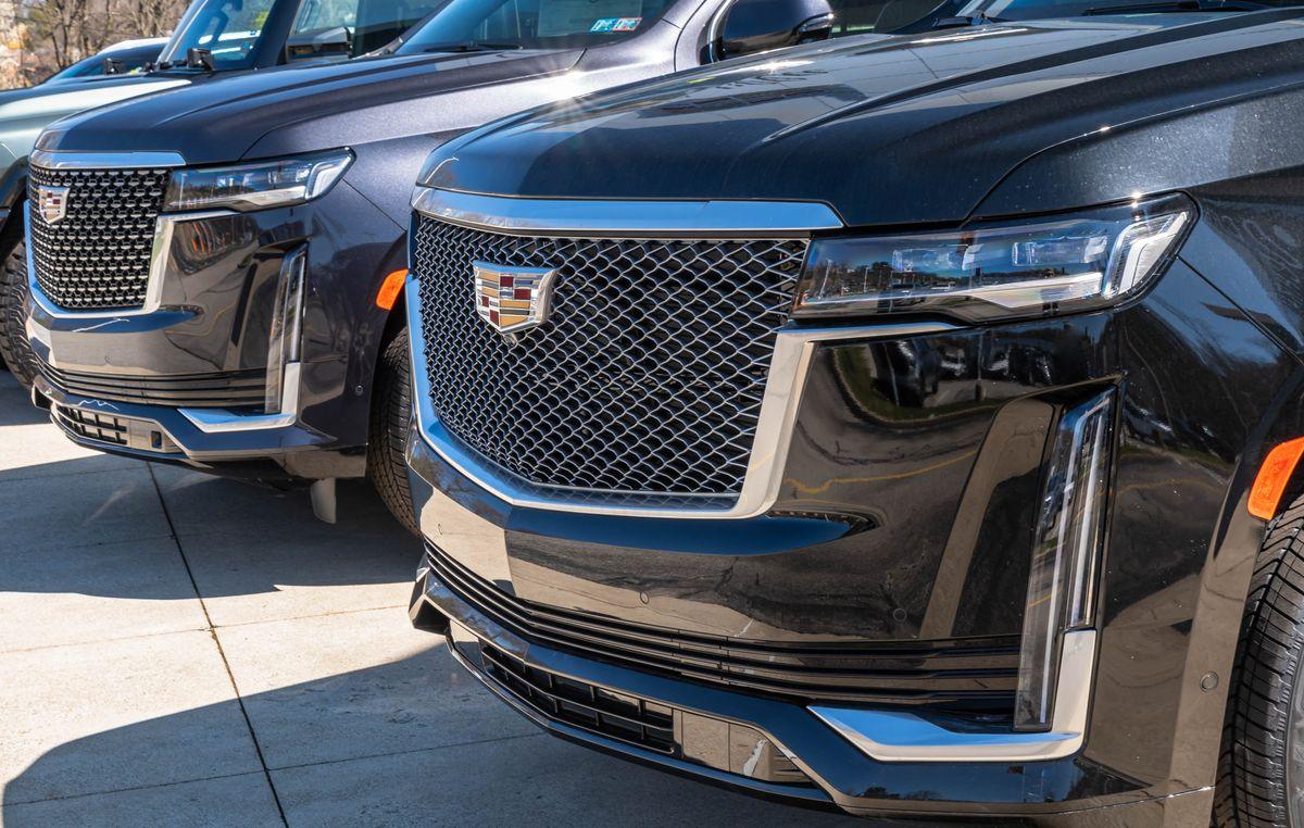 GetPrimeRide fleet — black Cadillac Escalades